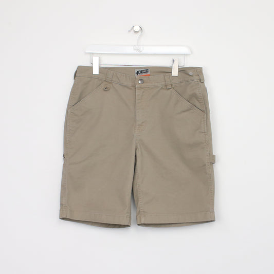 Vintage Duluth Trading Cargo shorts in tan. Best fits W34