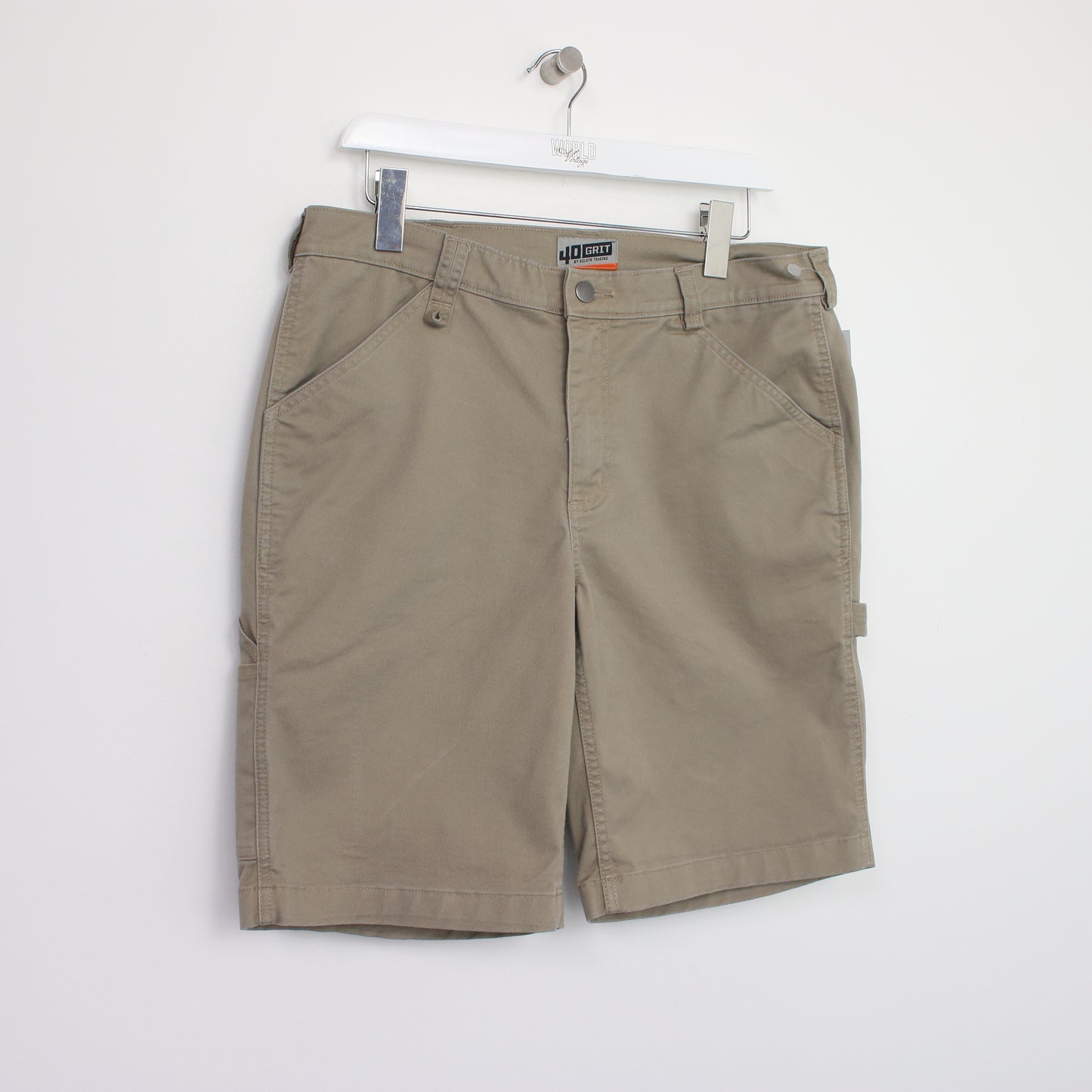 Vintage Duluth Trading Cargo shorts in tan. Best fits W34