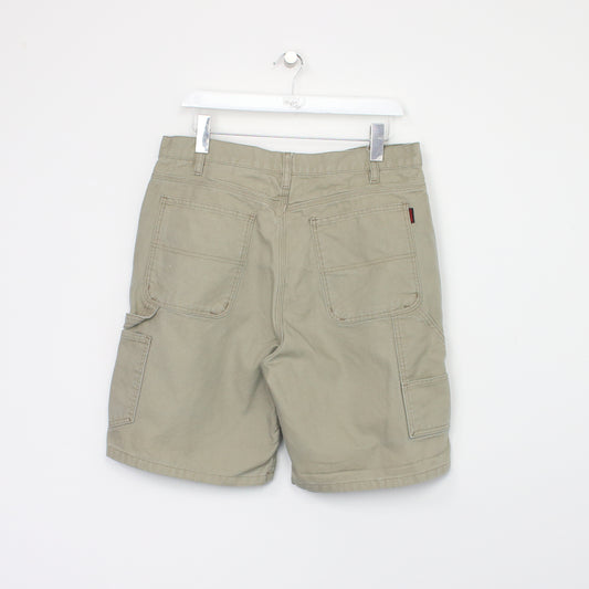 Vintage Wolverine Cargo shorts in tan. Best fits W34