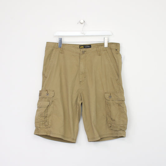 Vintage Lee Cargo shorts in tan. Best fits W36