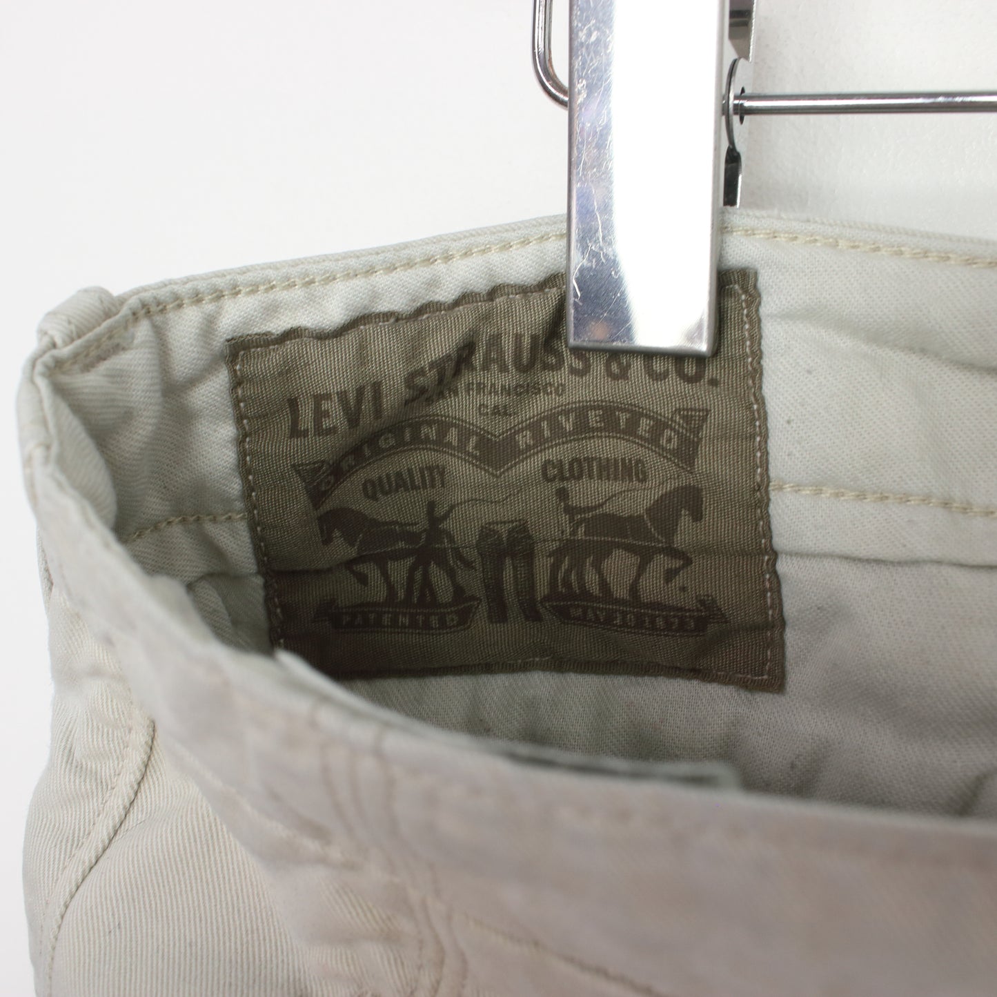 Vintage Levi's Cargo shorts in beige. Best fits W34