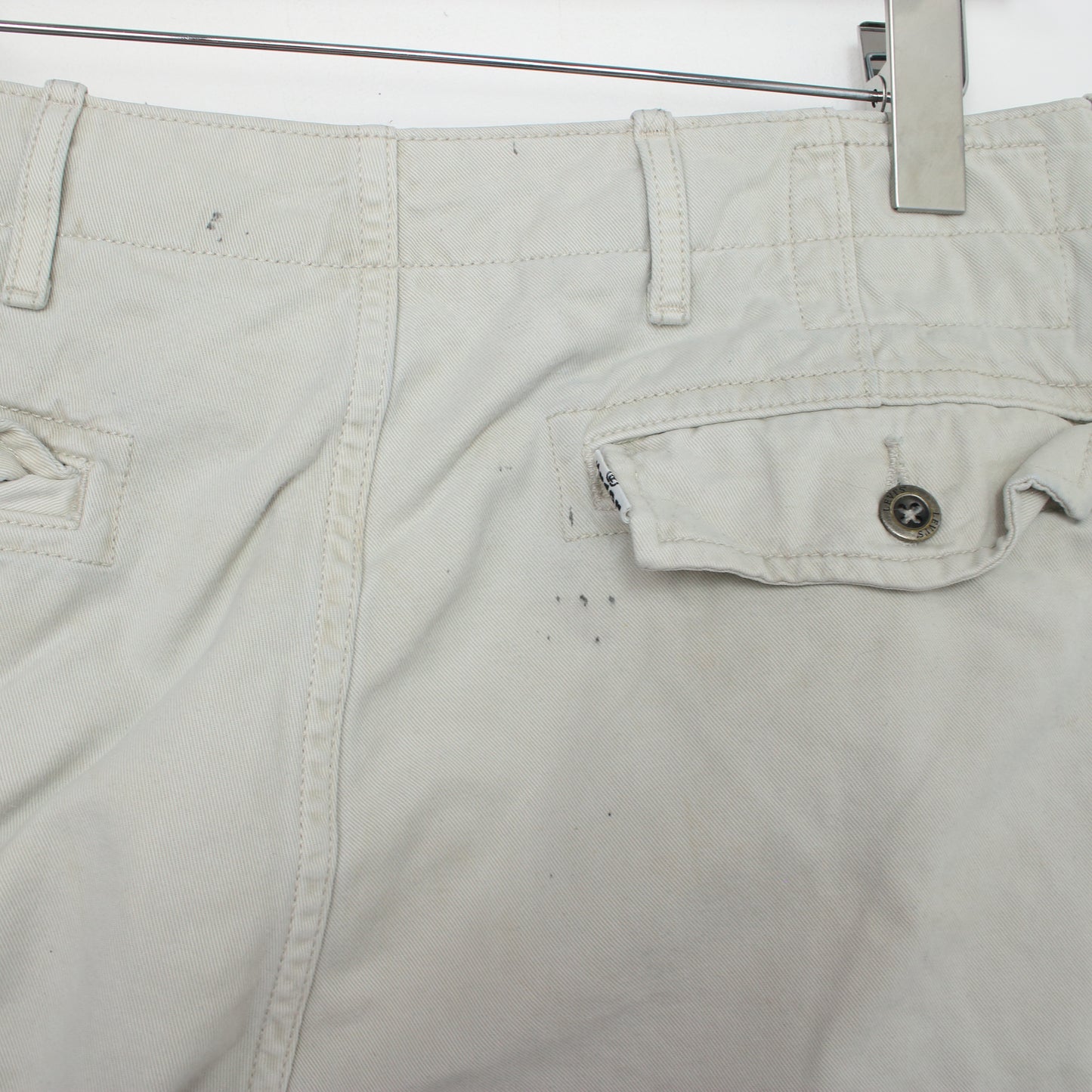 Vintage Levi's Cargo shorts in beige. Best fits W34