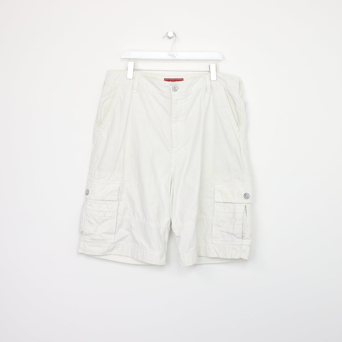 Vintage Levi's Cargo shorts in white. Best fits W40