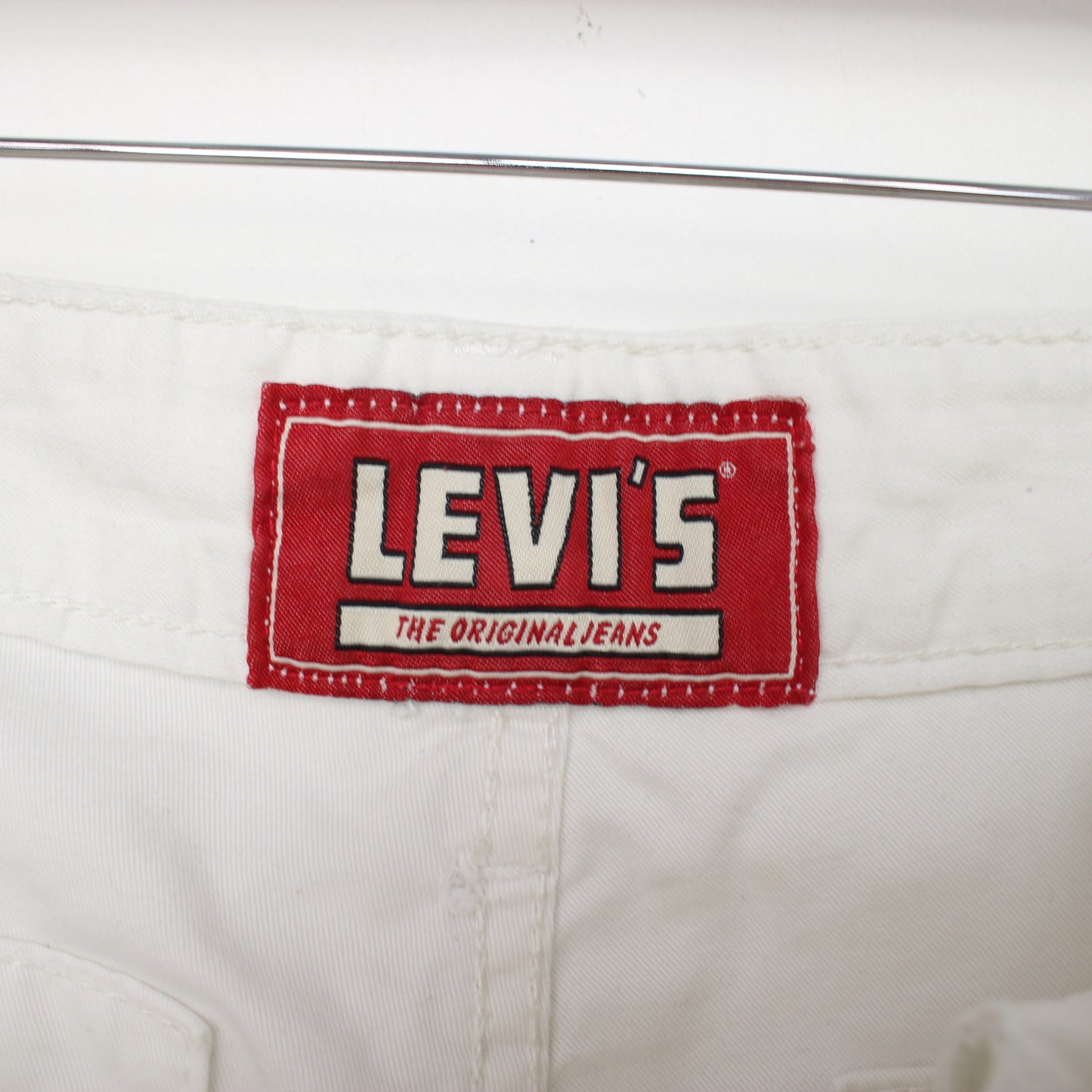 Vintage Levi's Cargo shorts in white. Best fits W40