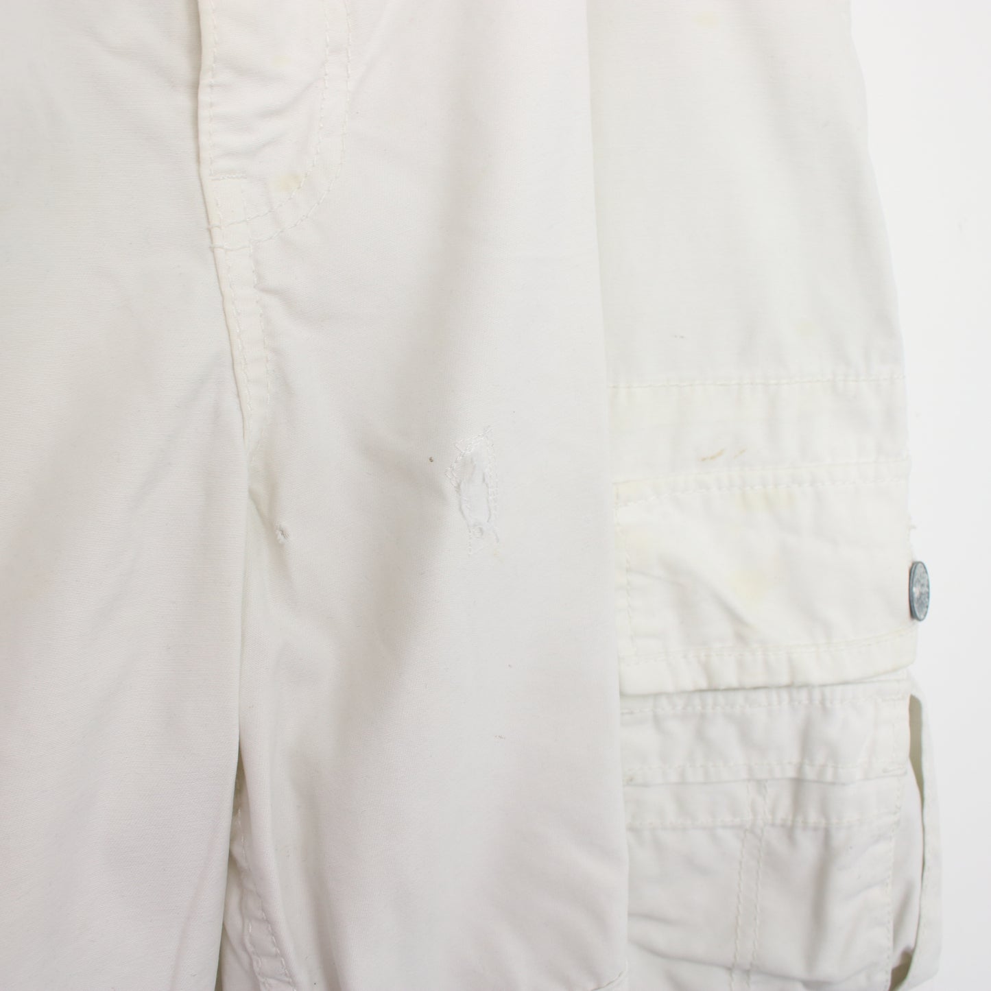 Vintage Levi's Cargo shorts in white. Best fits W40