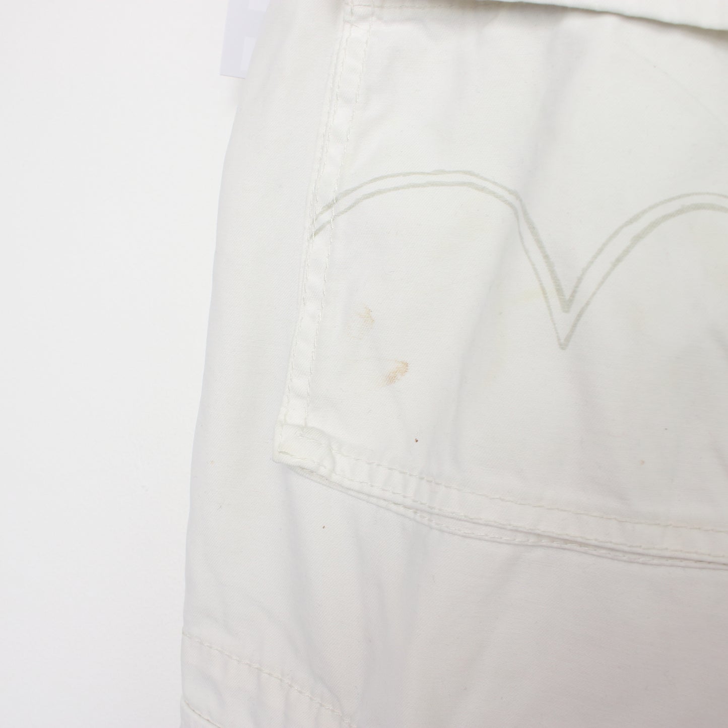 Vintage Levi's Cargo shorts in white. Best fits W40