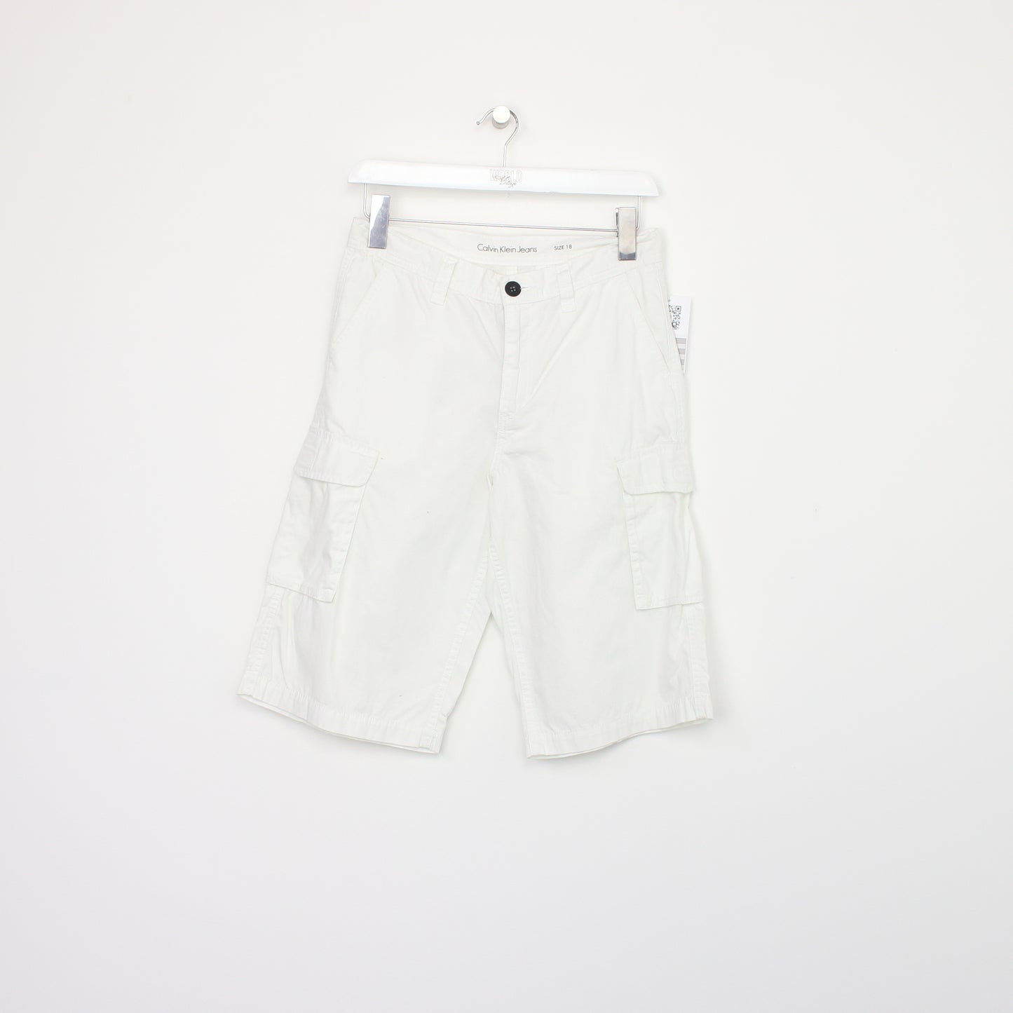 Vintage Calvin Klein cargo shorts in white. Best fits W28