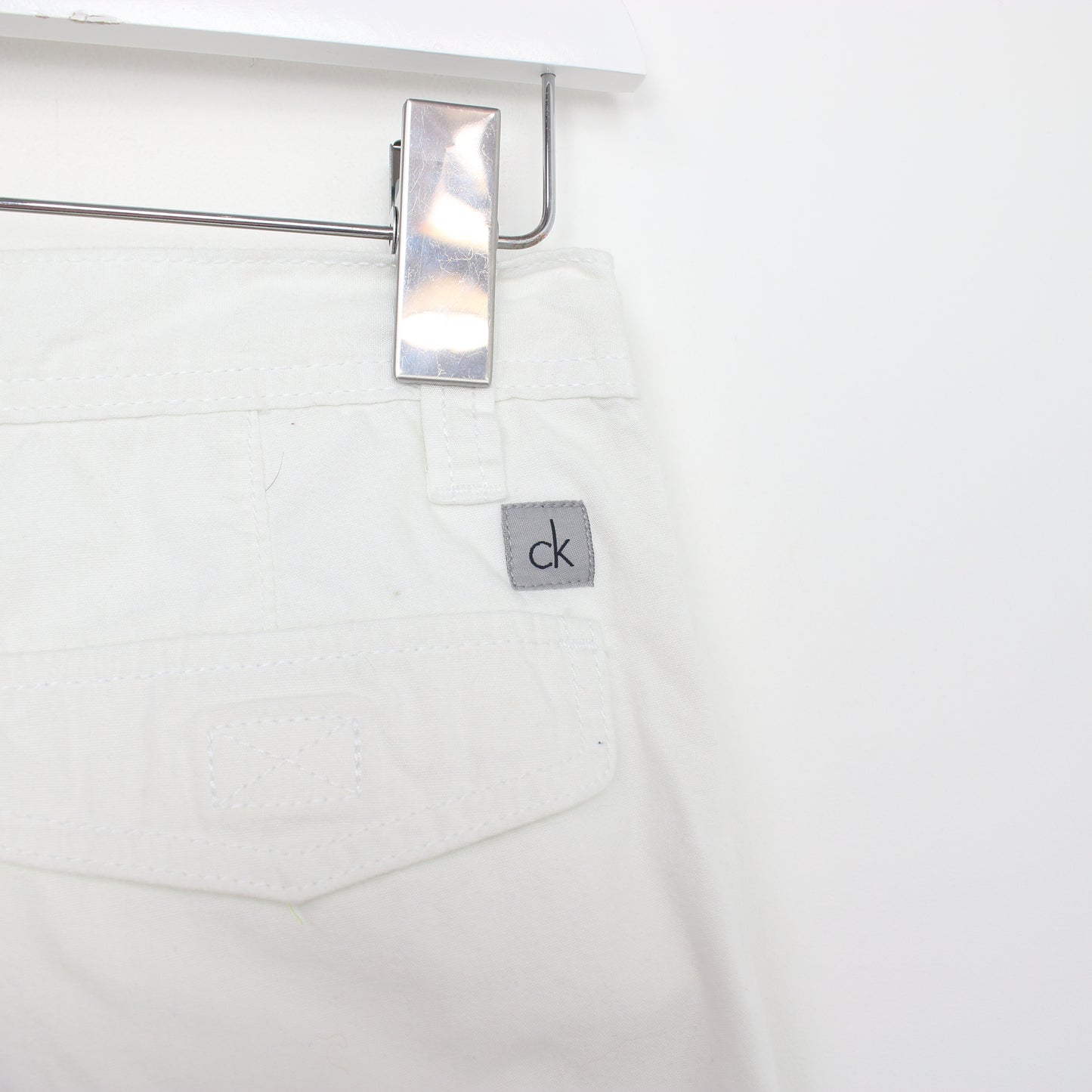 Vintage Calvin Klein cargo shorts in white. Best fits W28