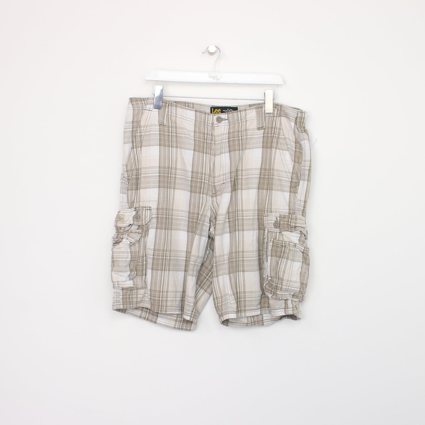 Vintage Lee Cargo shorts in beige tartan. Best fits W38