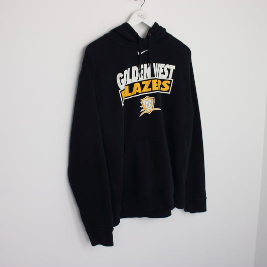 Vintage Nike hoodie in black. Best fits M