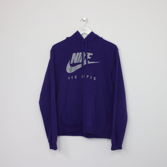 Vintage Nike hoodie in purple. Best fits M