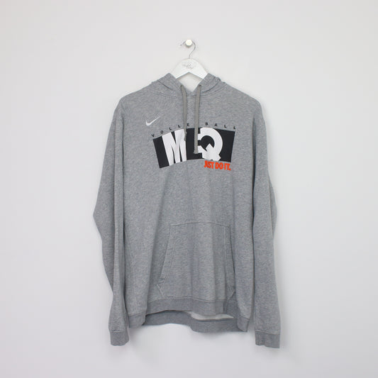 Vintage Nike hoodie in grey. Best fits L