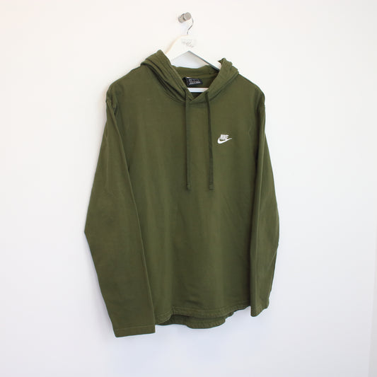 Vintage Nike hoodie in green. Best fits M