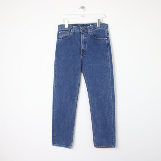 Vintage Levi jeans in blue. Best fits W33