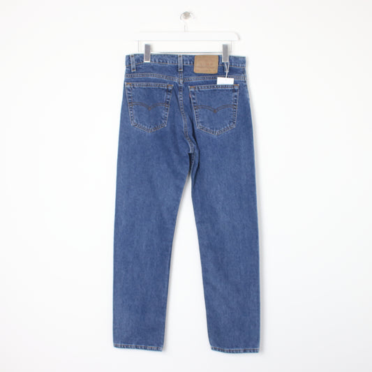 Vintage Levi jeans in blue. Best fits W33