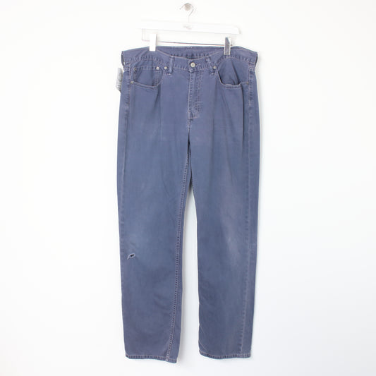 Vintage Levi jeans in blue. Best fits W36