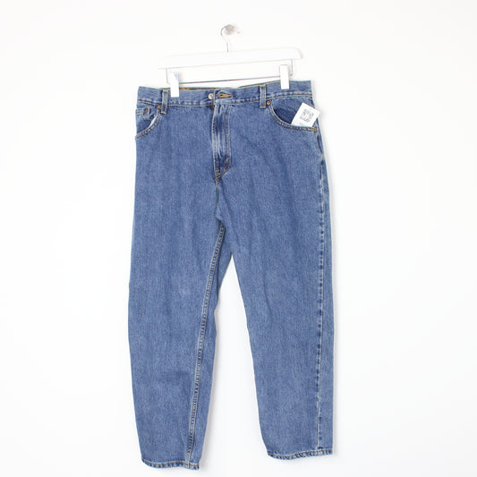 Vintage Levi jeans in blue. Best fits W34