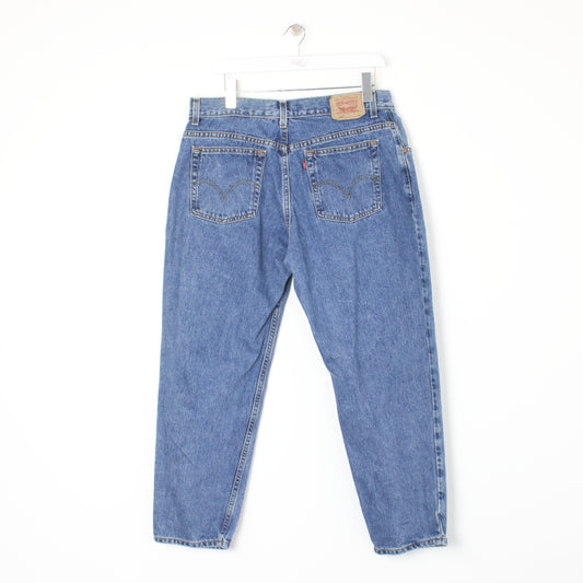 Vintage Levi jeans in blue. Best fits W34