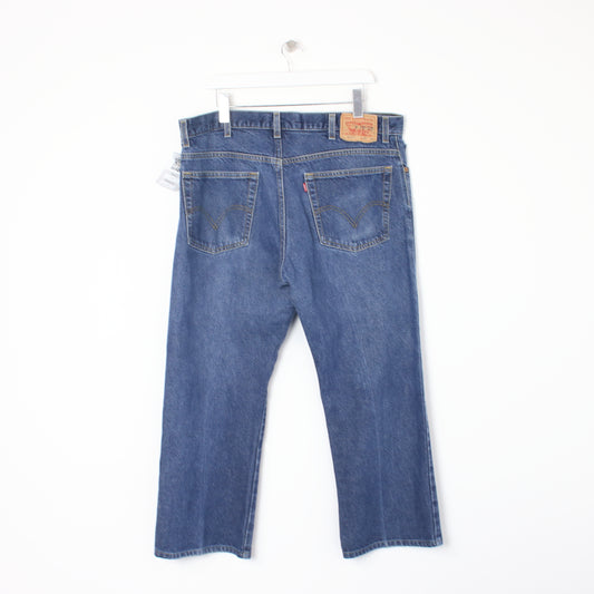 Vintage Levi jeans in blue. Best fits W40