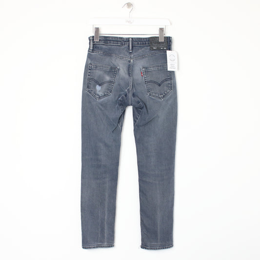 Vintage Levi jeans in grey. Best fits W30