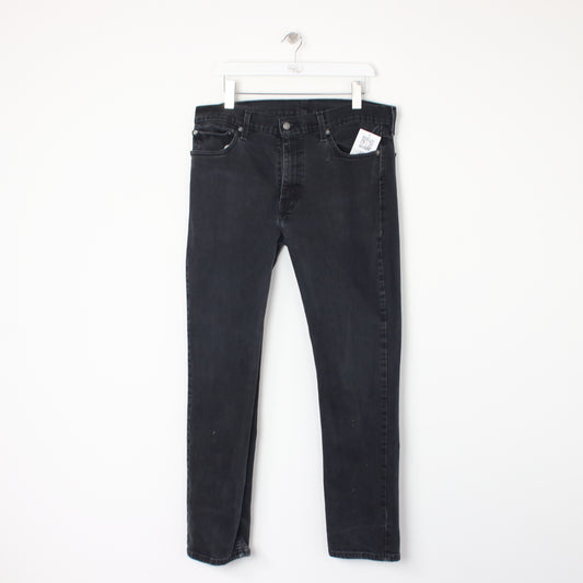 Vintage Levi jeans in black. Best fits W36