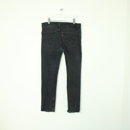 Vintage Levi jeans in black. Best fits W36