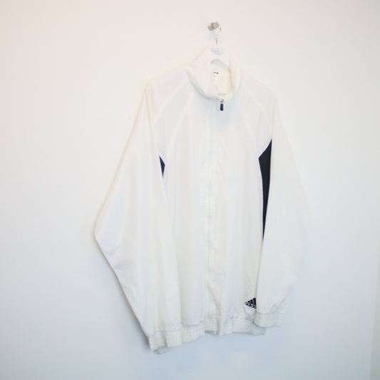 Vintage Adidas track jacket in white. Best fits XXL