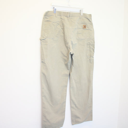 Vintage Carhartt carpenter jeans/trousers in beige. Best fits W42 L36