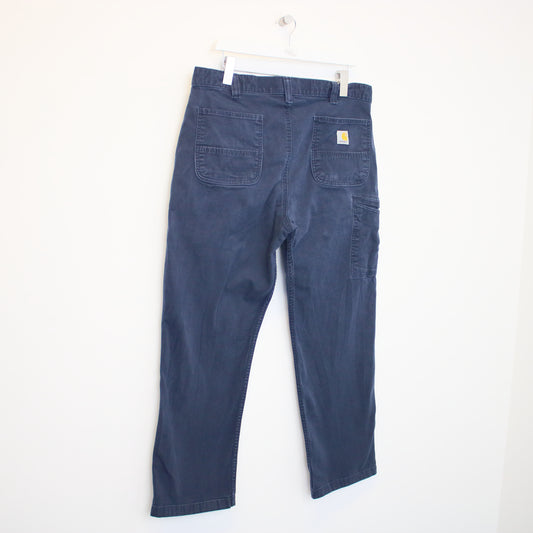 Vintage Carhartt carpenter jeans/trousers in navy. Best fits W38 L30