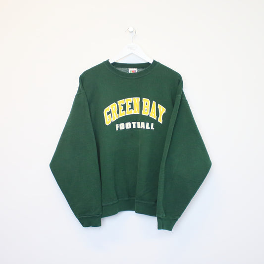 Vintage 90s Fruit of the Loom Green Bay Packers sweatshirt in dark green. Best fits L