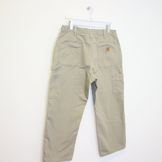 Vintage Carhartt carpenter jeans/trousers in stone grey. Best fits W36 L27