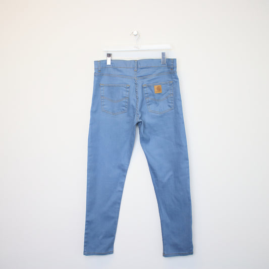 Vintage Carhartt tapered jeans in light blue. Best fits W36 L30