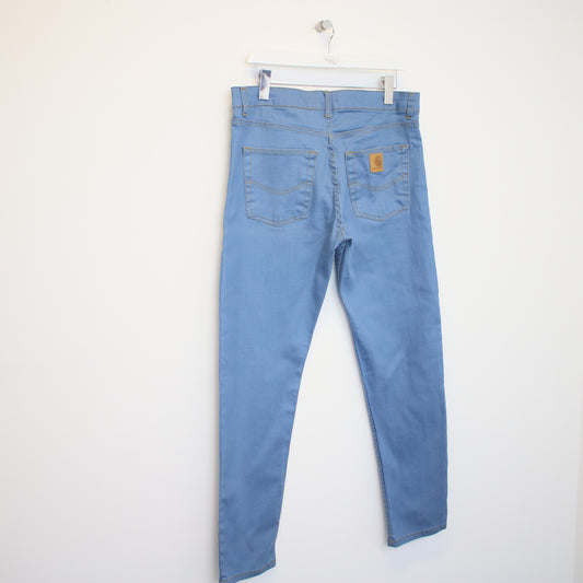 Vintage Carhartt tapered jeans in light blue. Best fits W36 L30