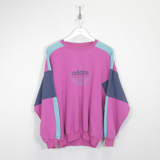 Vintage Adidas sweatshirt in pink. Best fits M