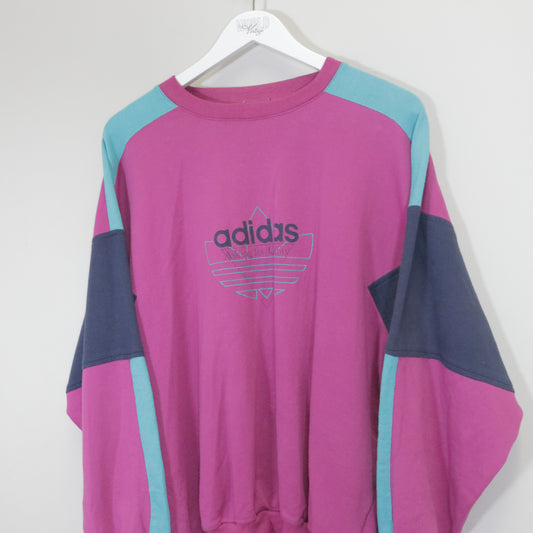 Vintage Adidas sweatshirt in pink. Best fits M