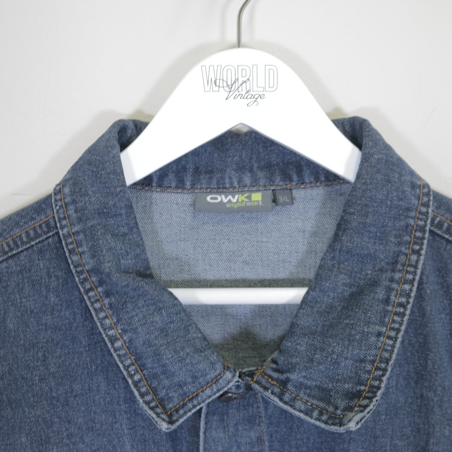 Vintage Owk denim jacket in blue. Best fits XL