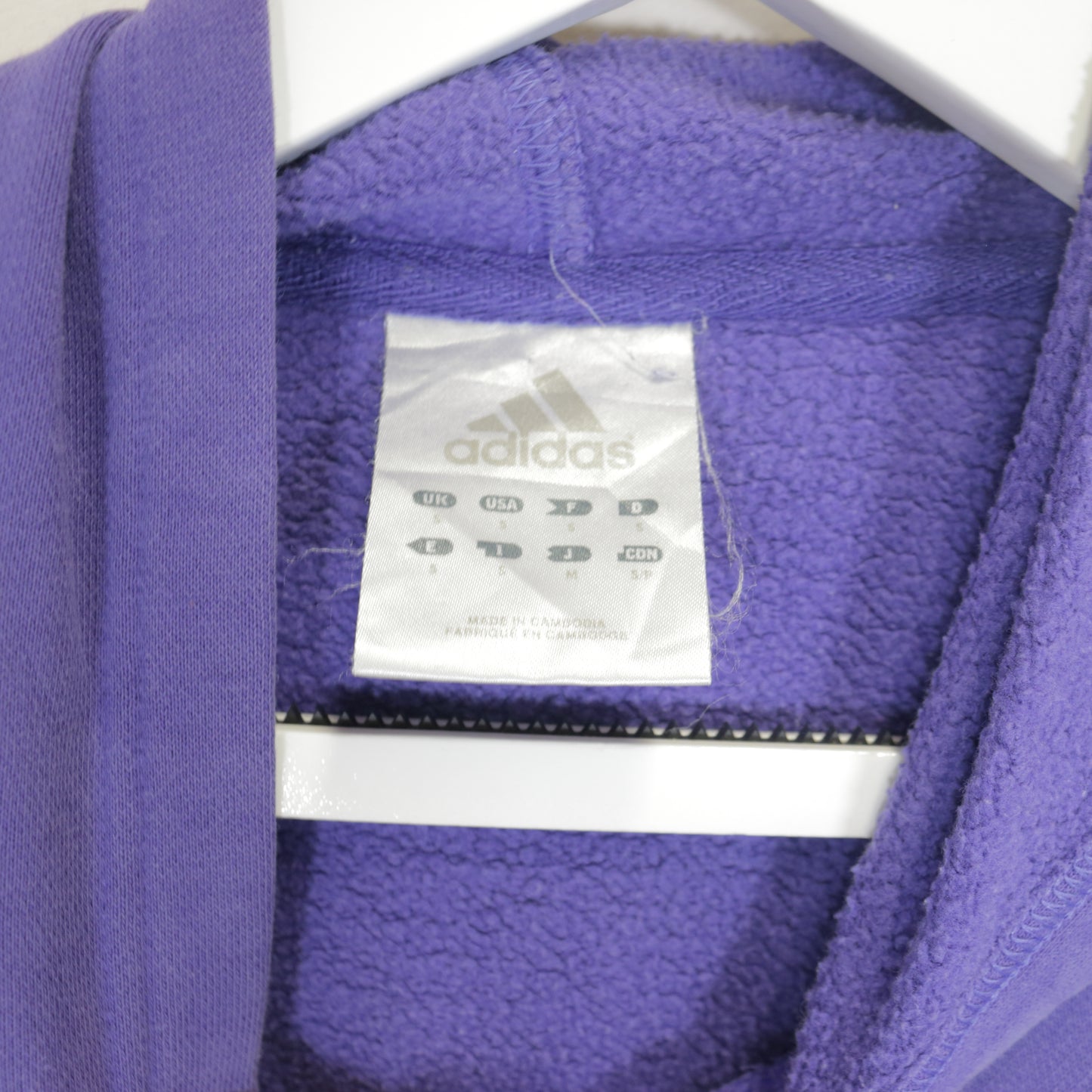 Vintage Adidas Reworked hoodie in purple. Best fits S