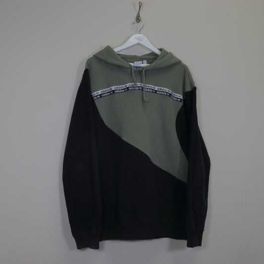 Vintage Adidas rework sweatshirt in black and green. Best fits L