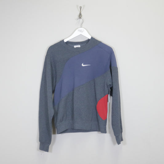 Vintage Nike reworked sweatshirt in grey. Best fits S