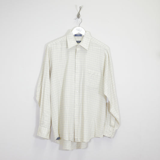 Vintage Izod shirt in striped yellow. Best fits L