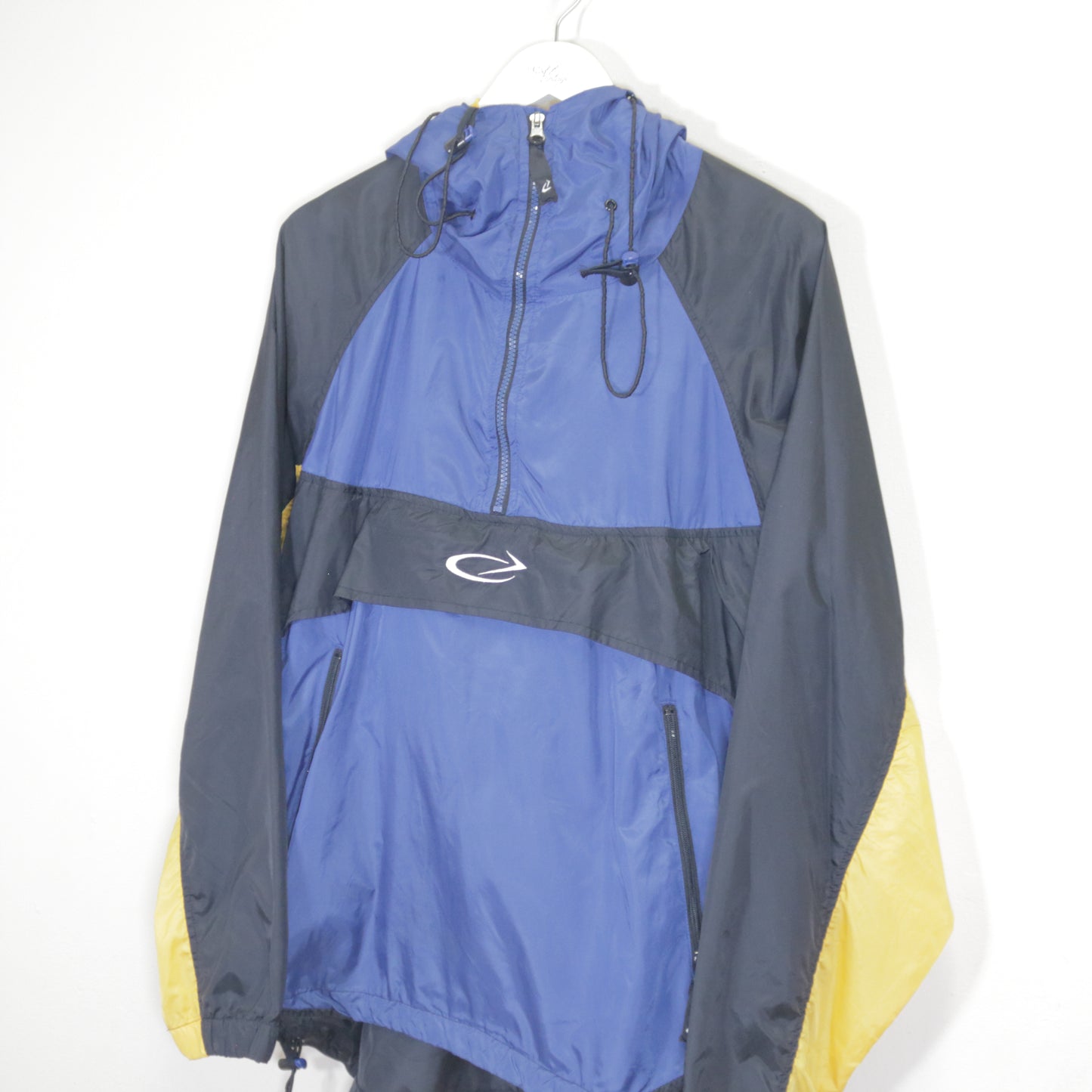 Vintage Unbranded shell festival jacket in yellow and blue. Best fits L