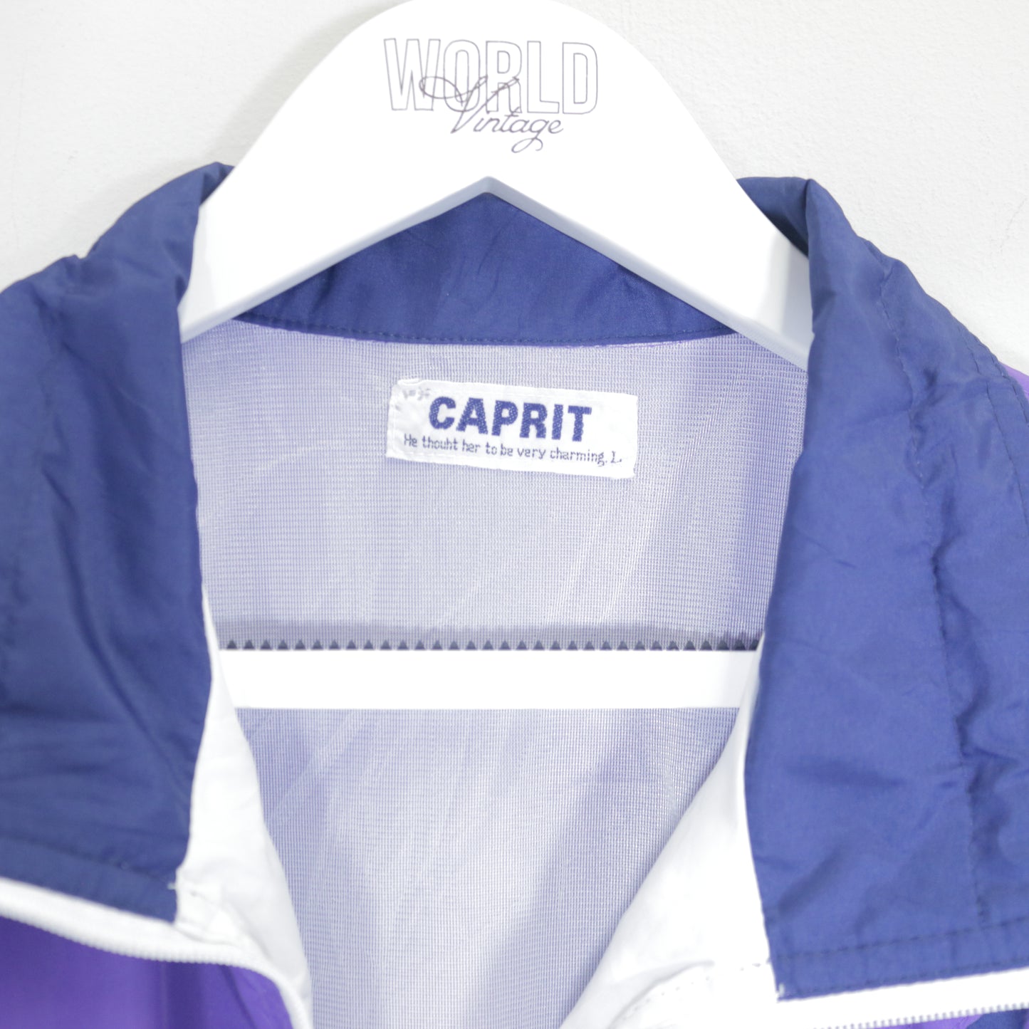 Vintage Caprit shell jacket in blue and purple. Best fits M