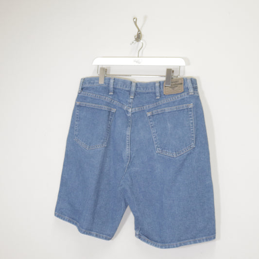 Vintage Wrangler denim cargo shorts in blue. Best fits W38