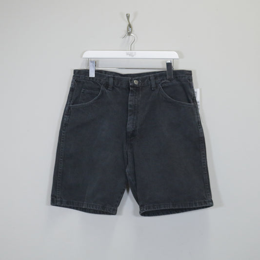 Vintage Wrangler denim shorts in black. Best fits W36