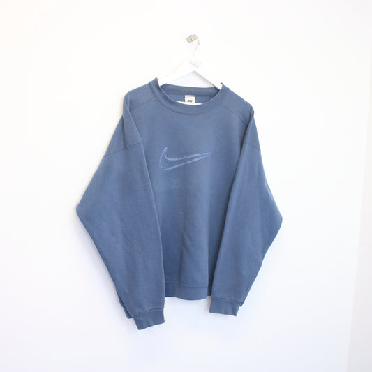 Vintage Nike swoosh logo sweatshirt in blue. Best fits XL