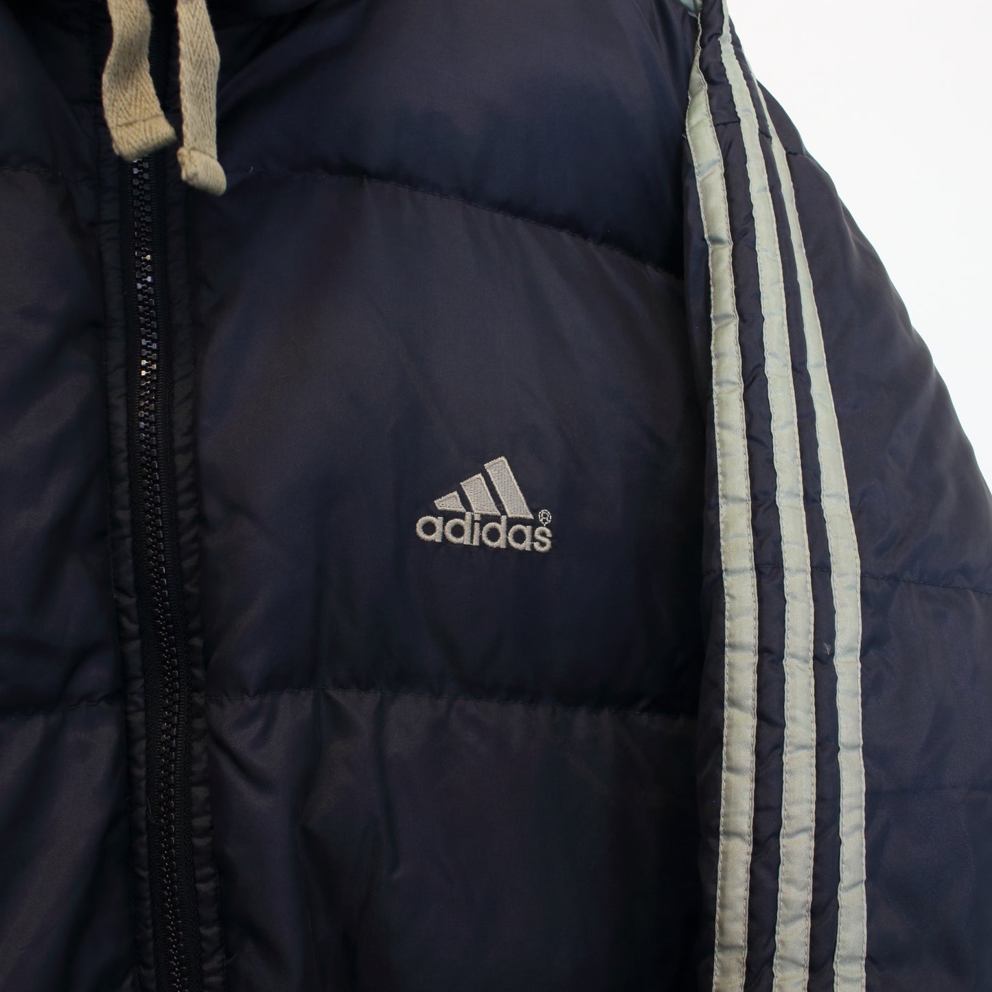 Vintage Adidas puffer jacket in navy. Best fits L