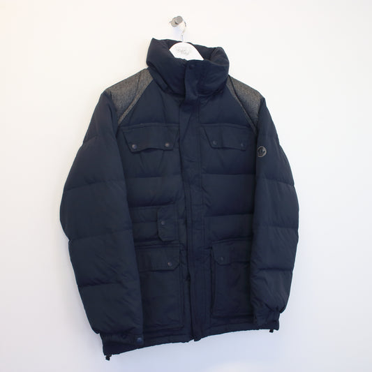 Vintage Adidas puffer jacket in navy and grey. Best fits M