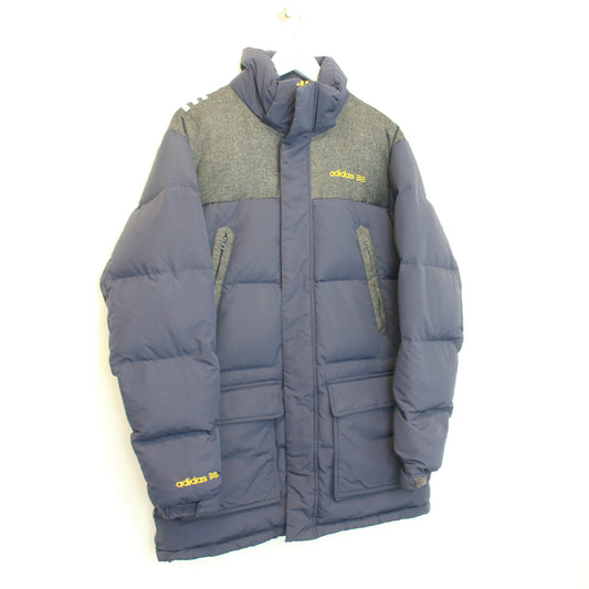 Vintage Adidas puffer jacket in navy and grey. Best fits L