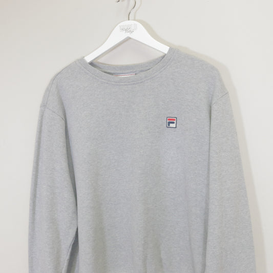 Vintage Fila sweatshirt in grey. Best fits M