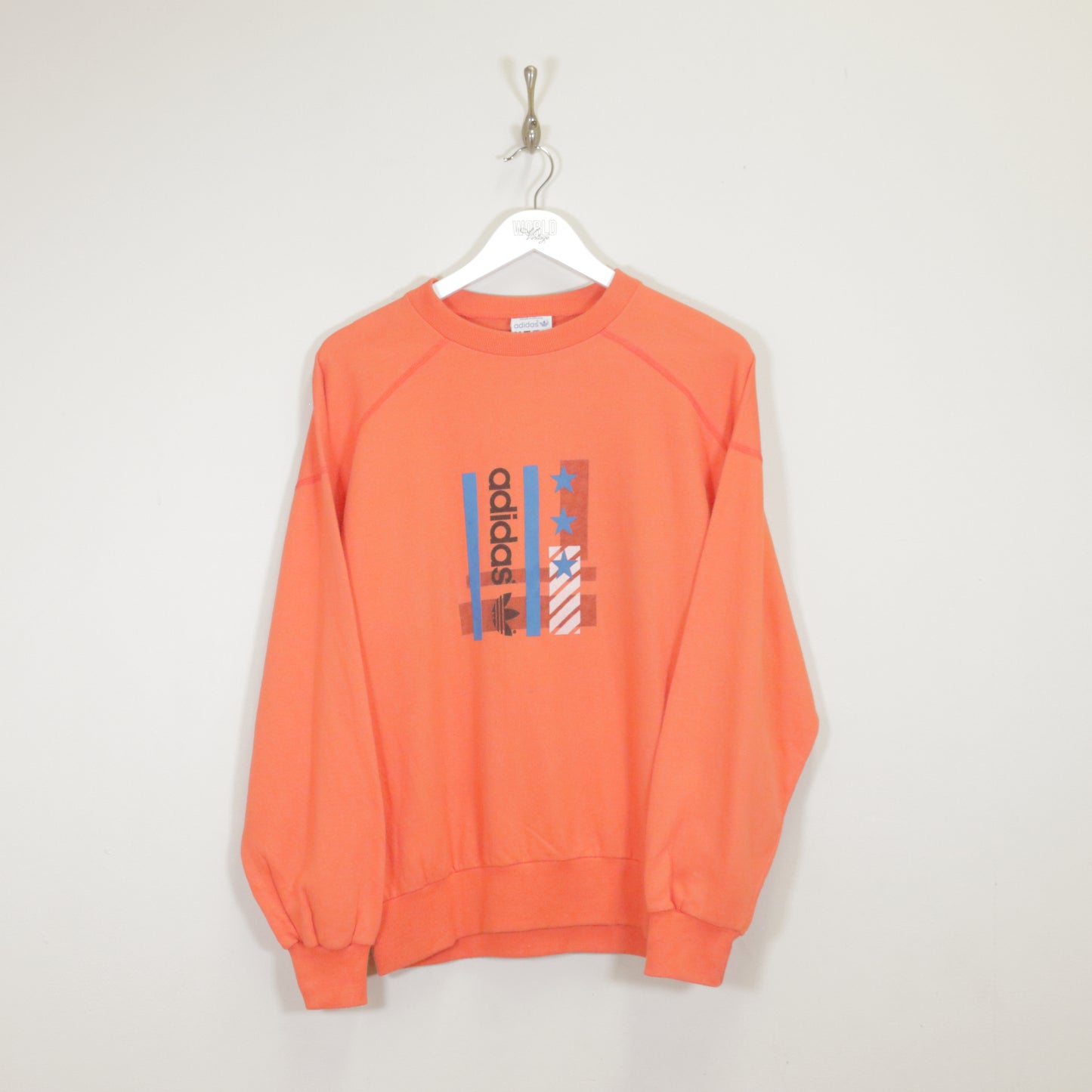 Vintage Adidas sweatshirt in orange. Best fits M